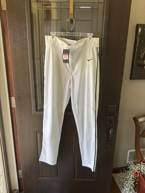 Nike White Baseball Pants with Green Side Stripe